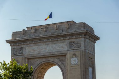 BUCHAREST, ROMANIA - AUGUST 17, 2021:  Sunset view of Arch of Triumph in city of Bucharest, Romania
