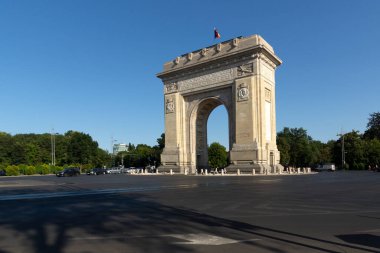 BUCHAREST, ROMANIA - AUGUST 17, 2021:  Sunset view of Arch of Triumph in city of Bucharest, Romania