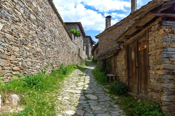 KOVACHEVITSA, BULGARIA - JUNE 30, 2020: Village of Kovachevitsa with Authentic nineteenth century houses, Blagoevgrad Region, Bulgaria