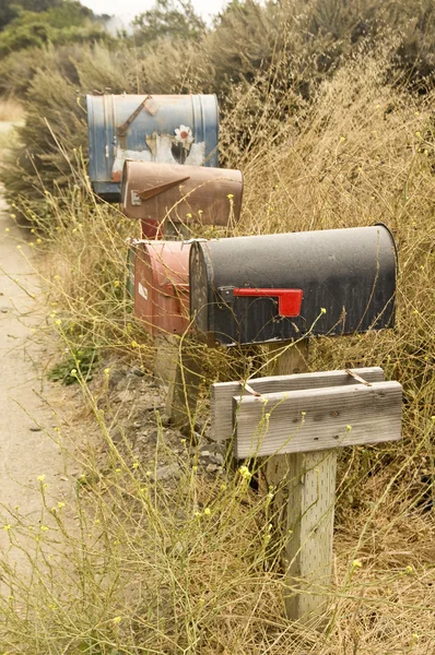 Een rij van landelijke mailboxen — Stockfoto