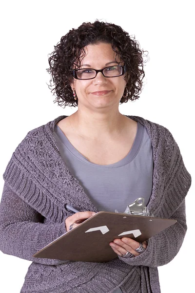 Beautiful Hispanic Woman With a Clipboard Royalty Free Stock Images