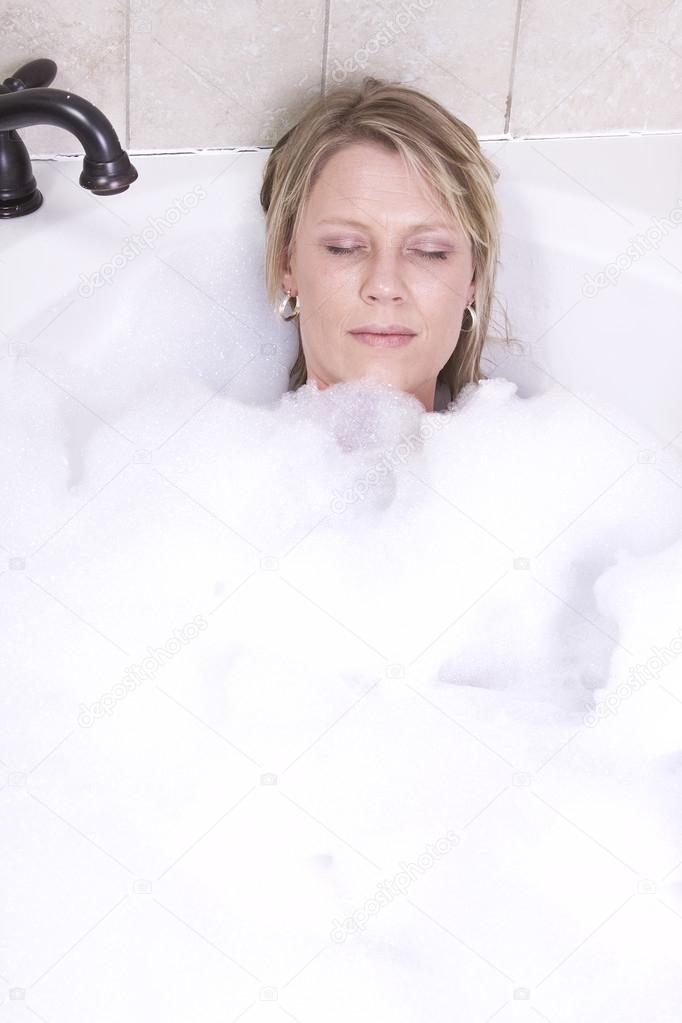 Woman Relaxing in the Tub