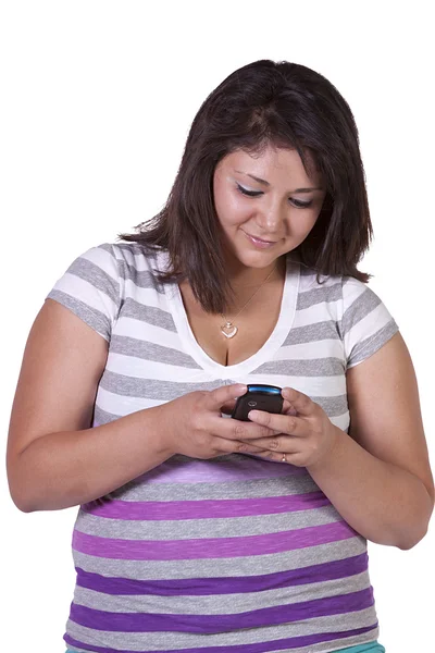 Schöne Mädchen SMS auf einem weißen Backboden — Stockfoto