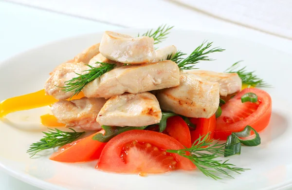 Chicken breast pieces with vegetables — Stock Photo, Image
