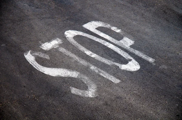 STOP painted on asphalt surface — Stock Photo, Image