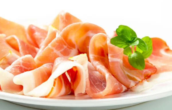 Prosciutto en rodajas finas —  Fotos de Stock