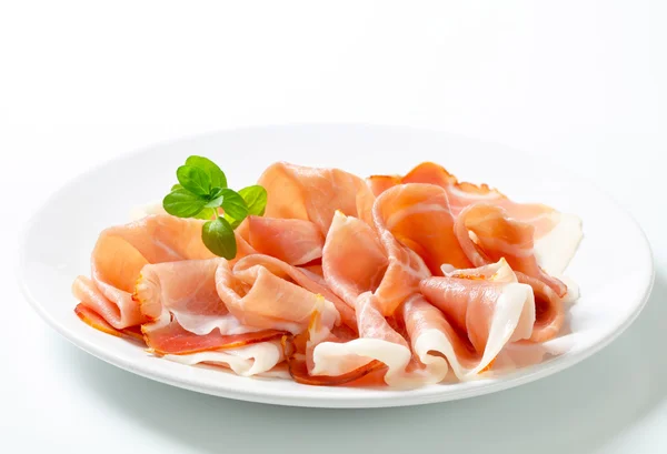 Thinly sliced prosciutto — Stock Photo, Image