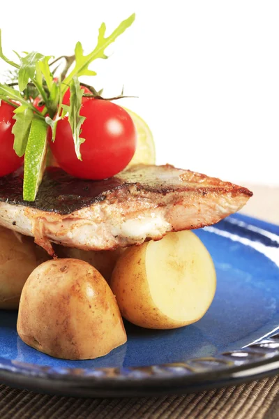 Pan fried fish with potatoes — Stock Photo, Image