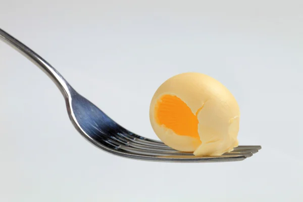 Enrolado de manteiga em um garfo — Fotografia de Stock
