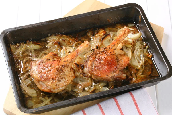 Roast duck legs with caraway and onion — Stockfoto