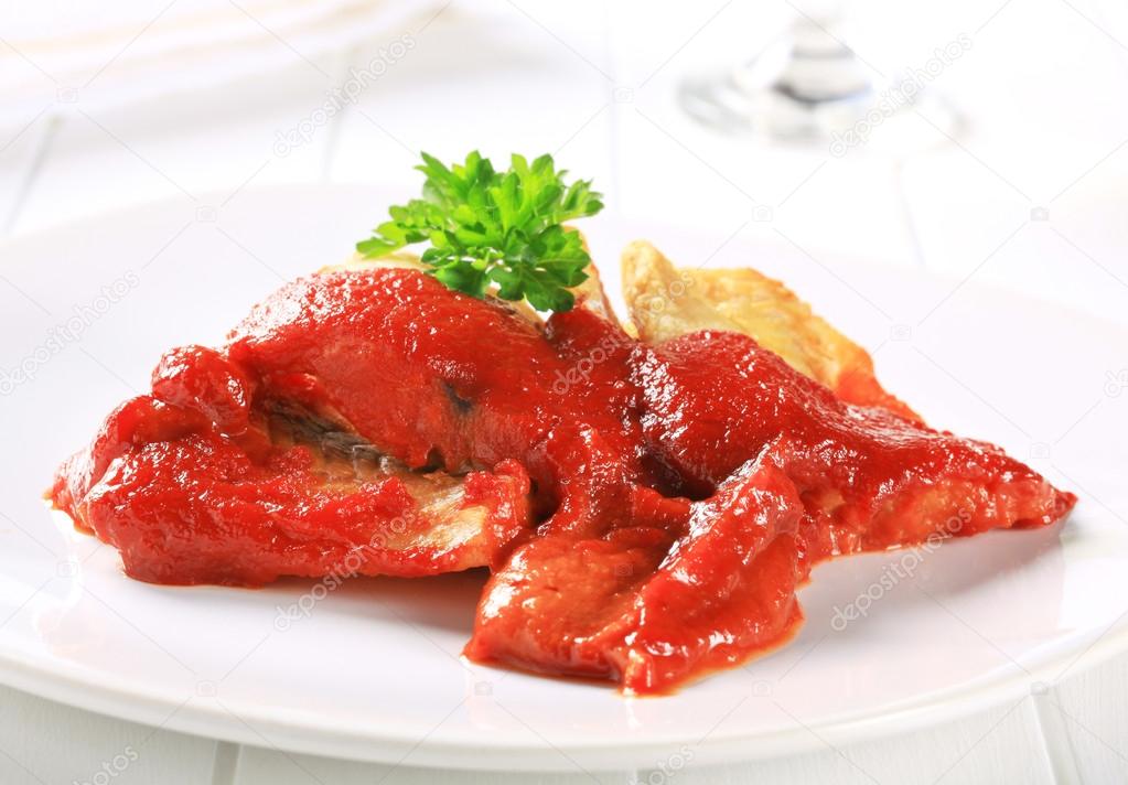 White fish fillets with tomato sauce