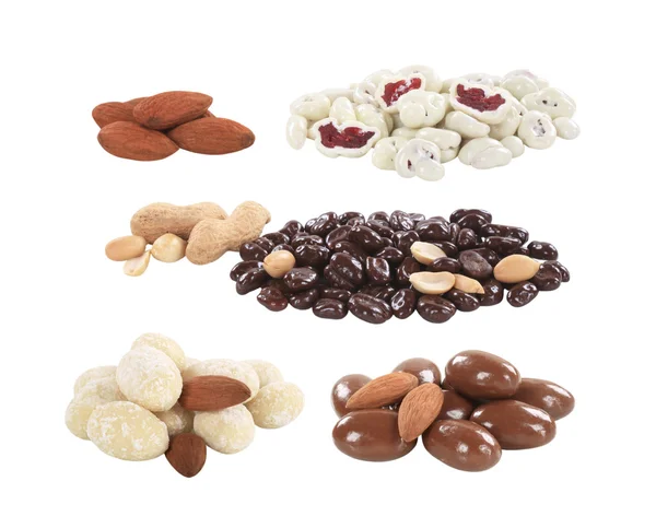 Chocolate coated nuts and fruit — Stock Photo, Image