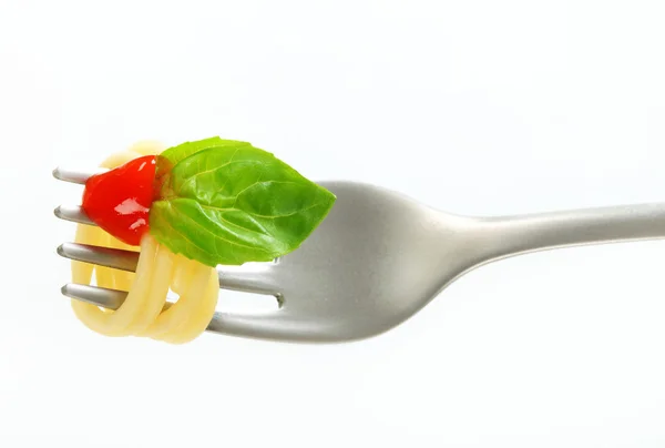 Spaghetti with ketchup on fork — Stock Photo, Image