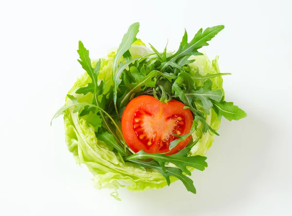 Rocket salad in lettuce bowl — Stock Photo, Image