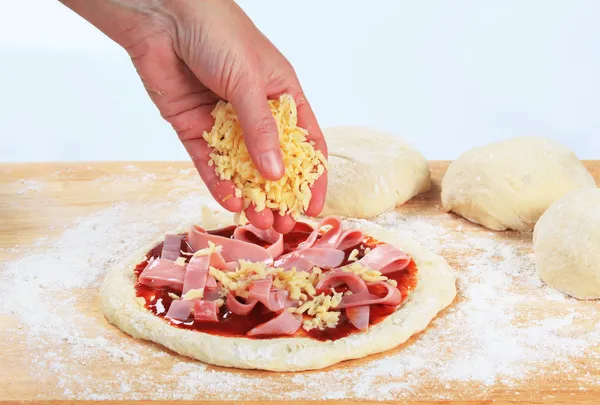 Cook preparing pizza — Stock Photo, Image