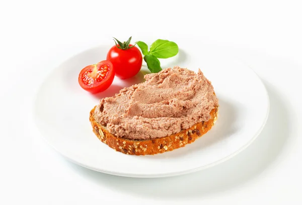 Bread with meat spread — Stock Photo, Image