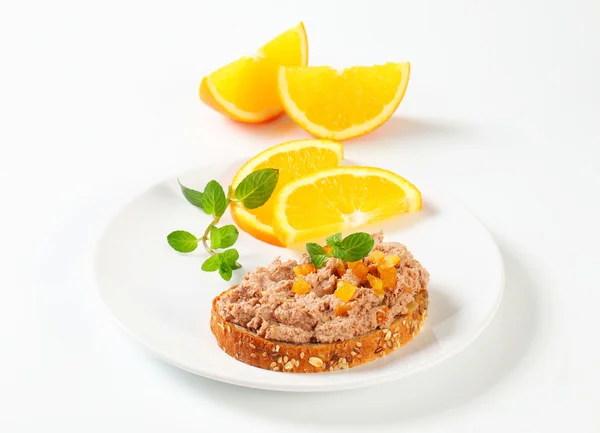 Bread with meat spread — Stock Photo, Image