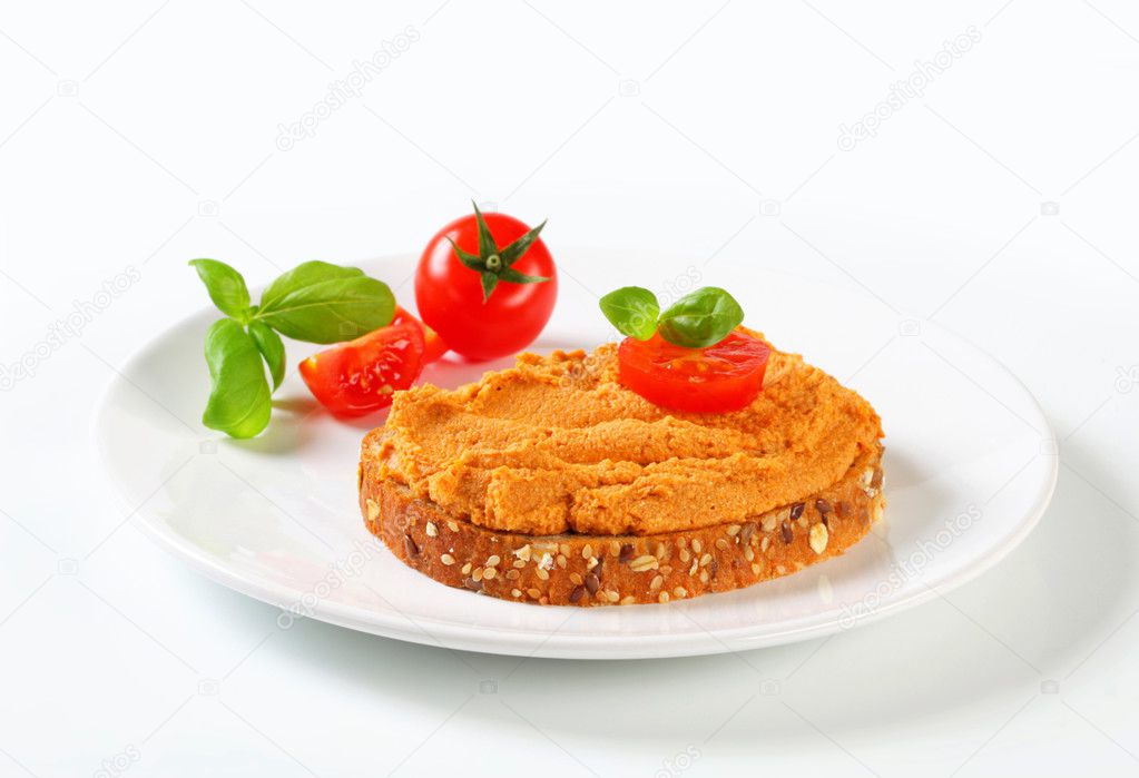 Bread with tomato spread — Stock Photo © ajafoto 26364735