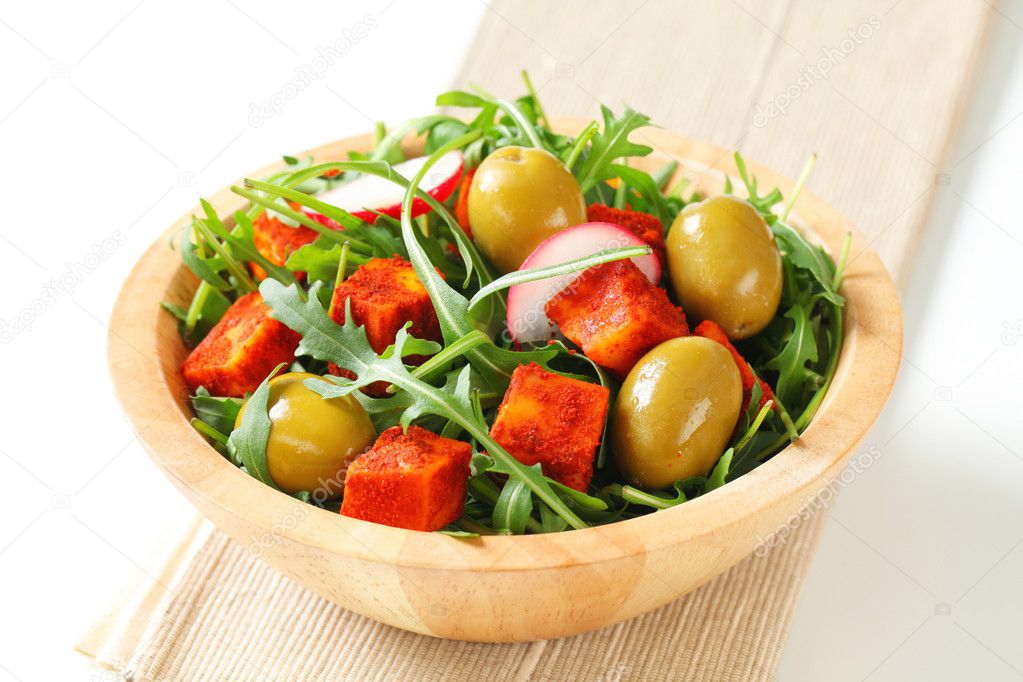 Salad greens with olives and spicy cheese — Stock Photo © ajafoto 26364873