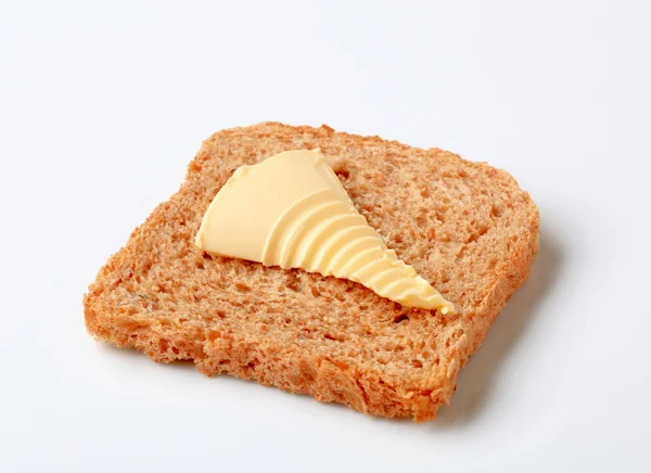 Brown bread and butter — Stock Photo, Image