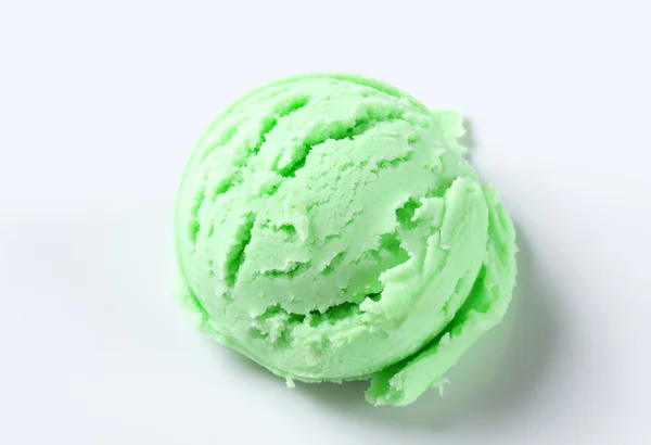 Scoop of green ice-cream — Stock Fotó