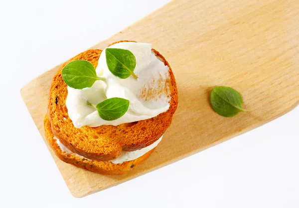 Mini toasts with cream cheese — Stock Photo, Image