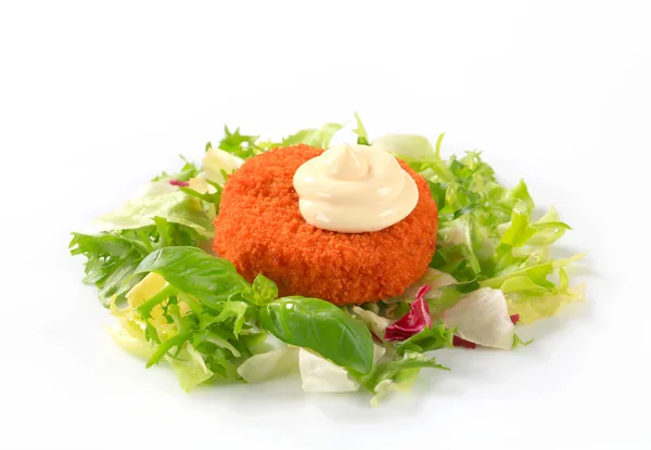 Fried cheese or fish with green salad — Stock Photo, Image