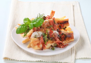 Pan fried fish fillets with fries clipart