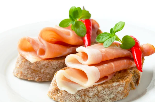 Prosciutto open geconfronteerd broodjes — Stockfoto