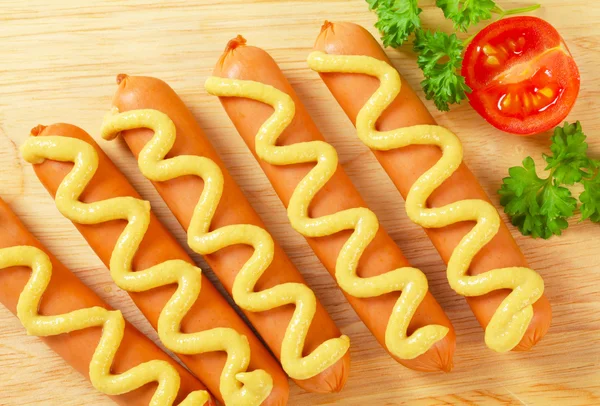 Frankfurters com mostarda — Fotografia de Stock