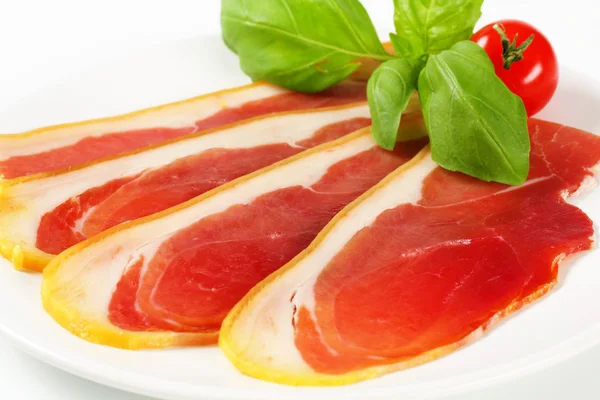 Sliced prosciutto crudo — Stock Photo, Image