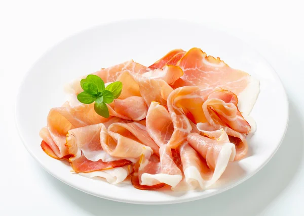 Prosciutto en rodajas finas — Foto de Stock