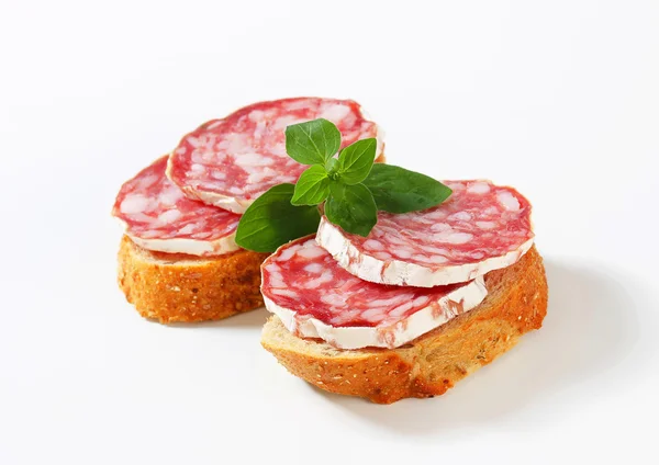 Salami canapes — Stock Photo, Image