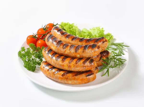 Гриль bratwursts — стокове фото