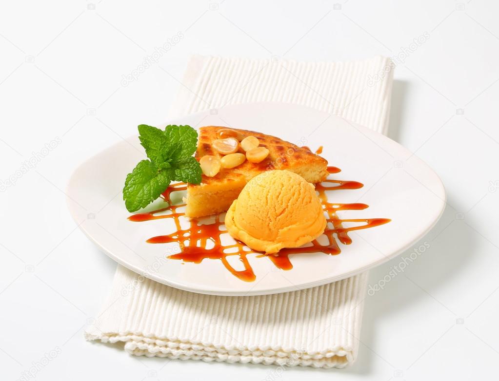 Almond cake with ice cream and caramel sauce