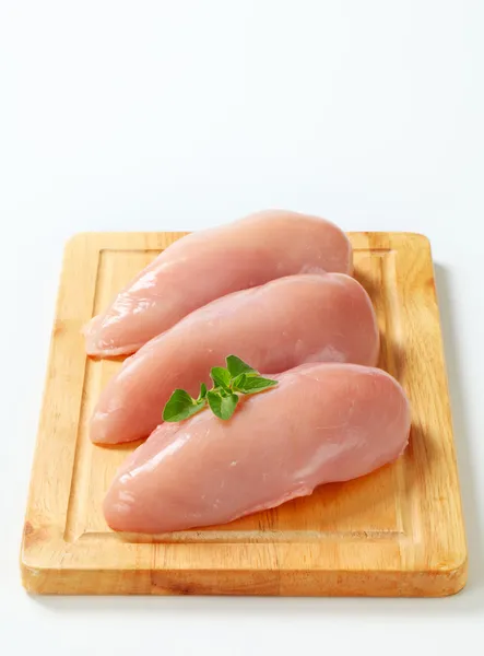 Filetes de pechuga de pollo crudo — Foto de Stock