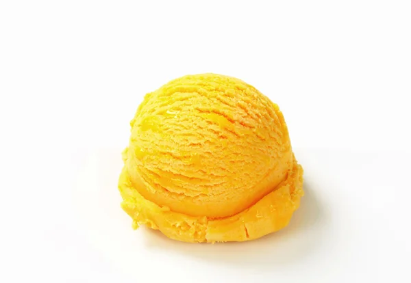 Scoop of yellow ice cream — Stock Photo, Image