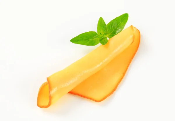 Fatia de queijo defumado — Fotografia de Stock