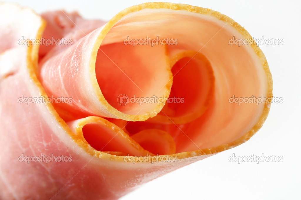 Thin slices of cooked ham, rolled up