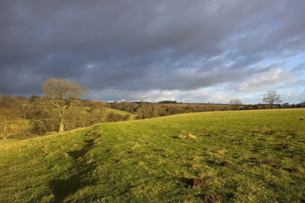 Storm clouds over landscape — Stock Photo, Image