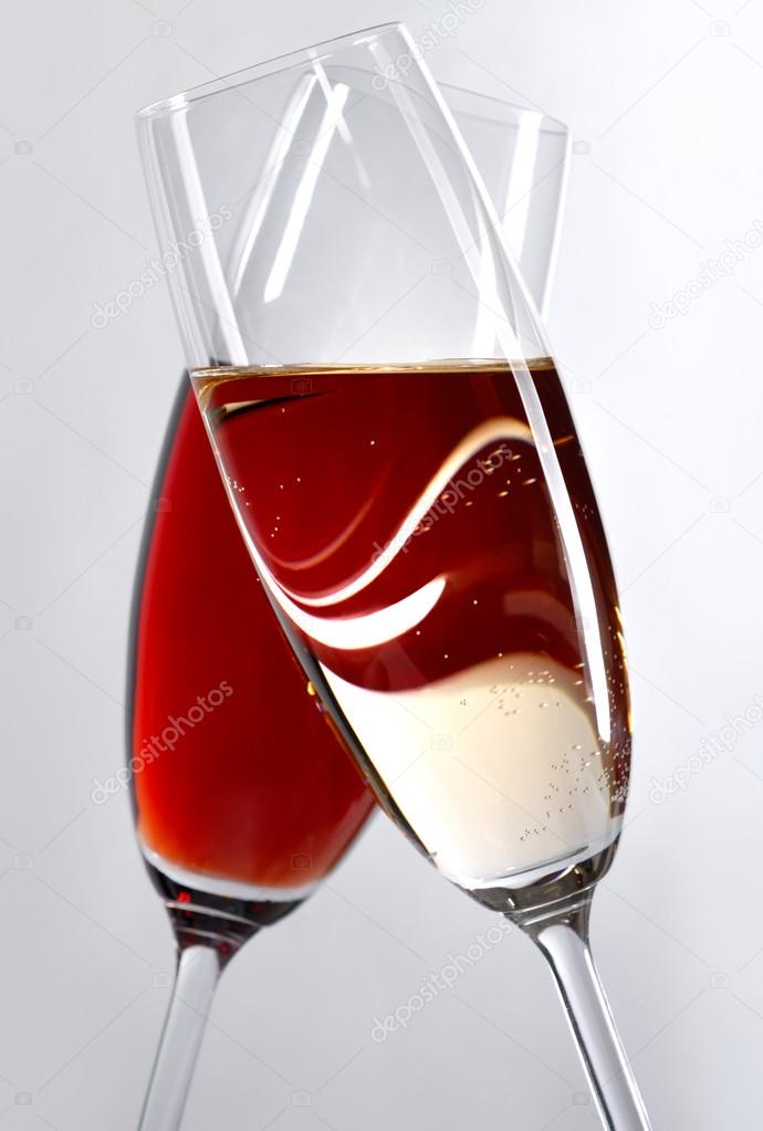 Two crossed wine glasses