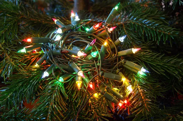 Christmas ornaments on a tree, closeup. — Stock Photo, Image