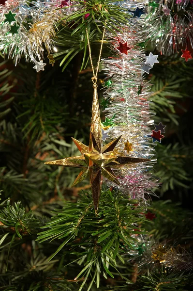 Christmas ornaments on a tree, closeup. — Stock Photo, Image