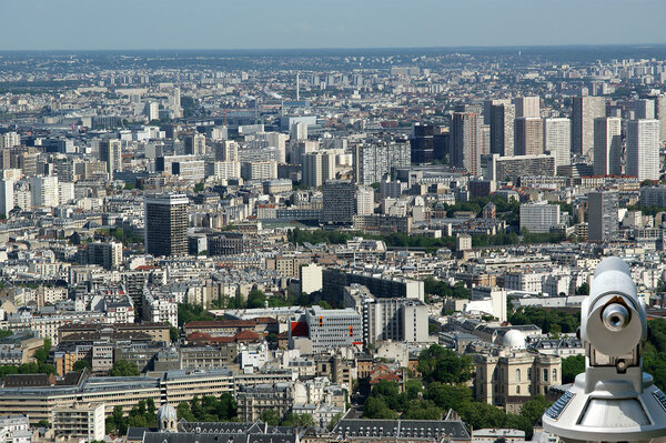 Telescope viewer and city skyline at daytime. Paris, France. Taken from the tour Montparnasse