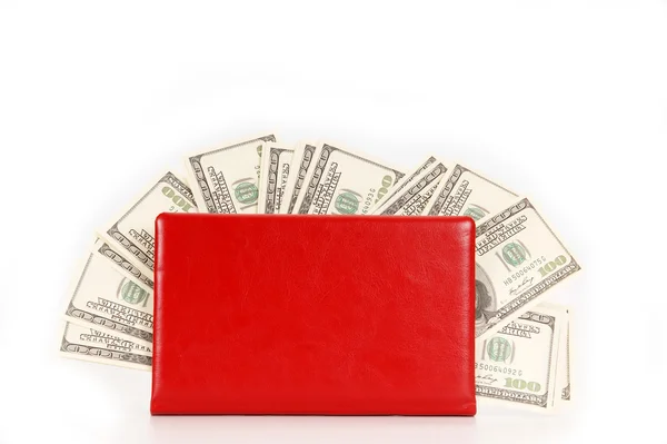 Hundred dollar bills money pile in a red notebook — Stock Photo, Image