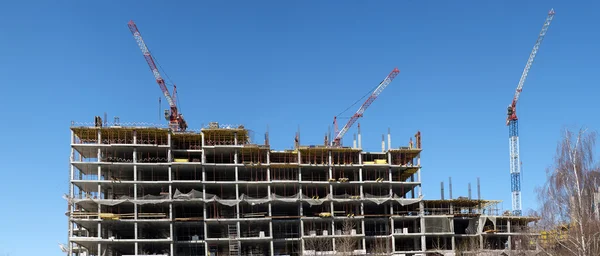 Cranes on a construction site, panorama — Stock Photo, Image