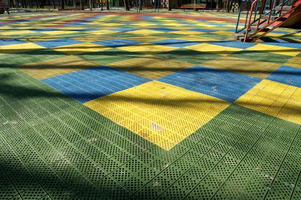 Public playground in a sunny day. — Stock Photo, Image