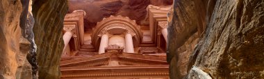 Al Khazneh or The Treasury at Petra, Jordan-- it is a symbol of Jordan, as well as Jordan's most-visited tourist attraction. Petra has been a UNESCO World Heritage Site since 1985 clipart