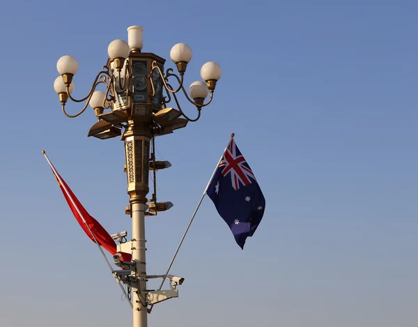 Street lamp on Tiananmen Square in Beijing, China with propaganda or public announcement speakers