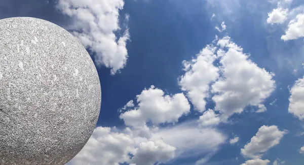 Large Granite Ball Background Sky Clouds — Stock Photo, Image